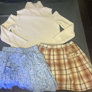 Cream Turtleneck with Blue Floral and Plaid Skirts